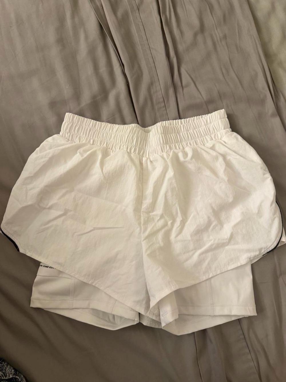 Women’s White Elastic Waist Athletic Shorts with Layered Hem